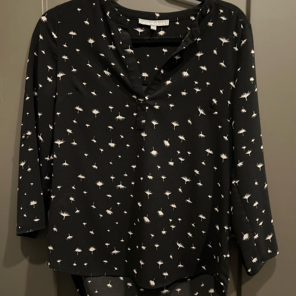 Black 3/4 sleeve blouse with a whimsical design
